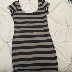 This fun, and flirty Guess dress is perfect for summer or fall.